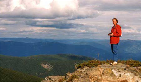 Vicki Bleile standing on Clifty Mountain.
